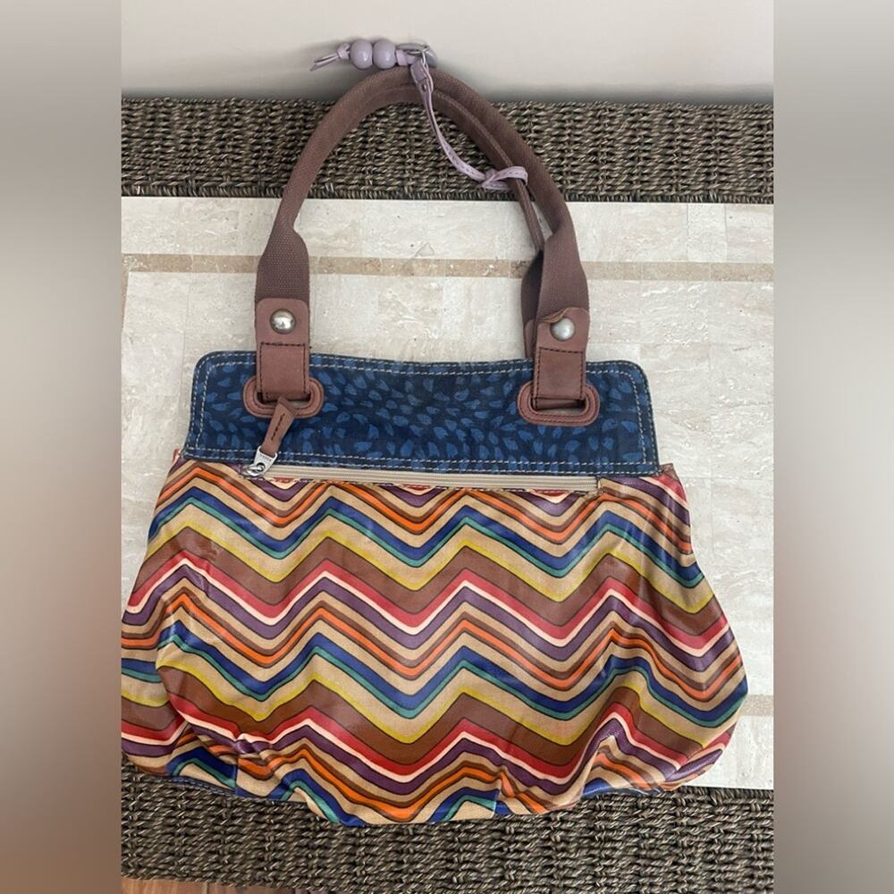 Fossil messenger handbag. Waxed canvas and leather.